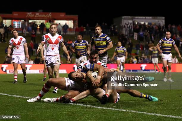 Jarryd Hayne of the Eels scores a try during the round 16 NRL match between the St George Illawarra Dragons and the Parramatta Eels at WIN Stadium on...