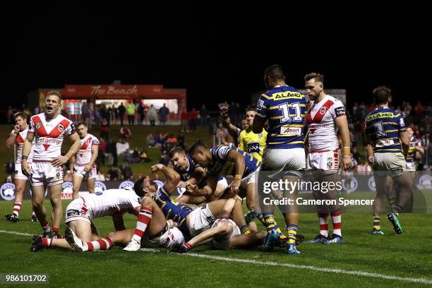 Jarryd Hayne of the Eels scores a try during the round 16 NRL match between the St George Illawarra Dragons and the Parramatta Eels at WIN Stadium on...