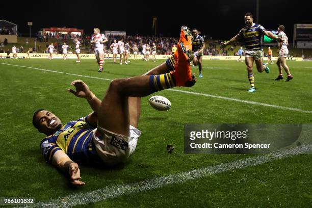 George Jennings of the Eels attempts to score a try that is disallowed during the round 16 NRL match between the St George Illawarra Dragons and the...