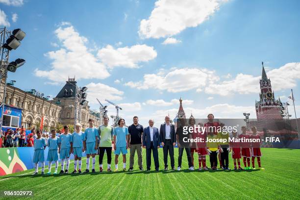 Iker Casillas, Alexey Smertin, Ronaldo, Vladimir Putin, Gianni Infantino, Lothar Matthaus, Carles Puyol and Dmitry Bulykin pose during Football Event...