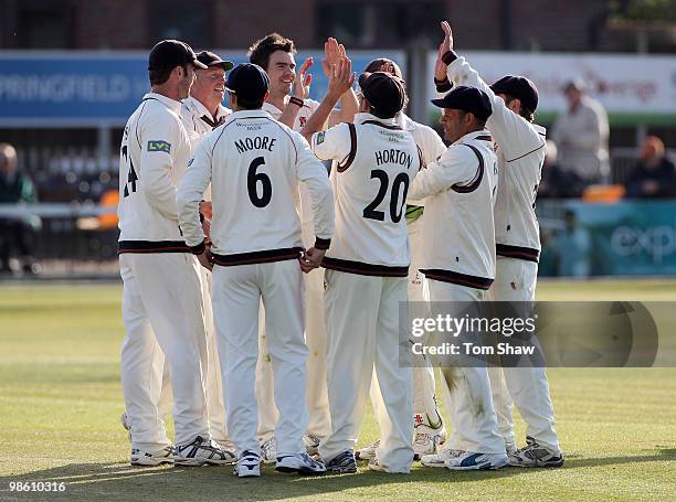 James Anderson of Lancashire celebrates with teammates after taking the wicket of John Maunders of Essex during the LV County Championship match...
