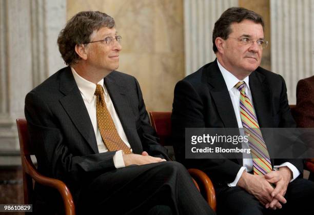 Bill Gates, founder of Microsoft Corp. And co-chairman of the Bill and Melinda Gates Foundation, left, and James Flaherty, Canada's finance minister,...