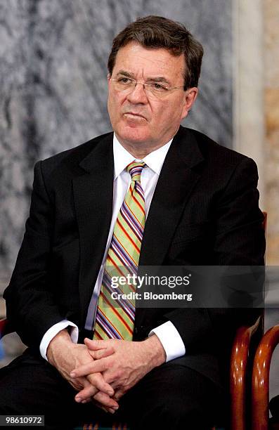 James Flaherty, Canada's finance minister, listens during an event on strengthening global food security at the Treasury building in Washington,...