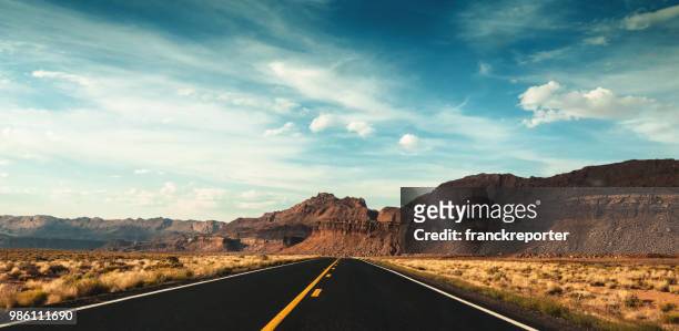 driving on moab - utah landscape stock pictures, royalty-free photos & images