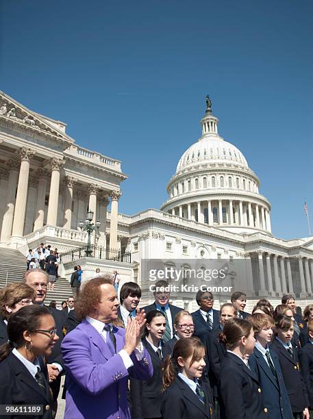 Richard Simmons celebrates with children for the passage of the Fitness Integrated with Teaching Kids Act at the US Capitol on April 22, 2010 in...
