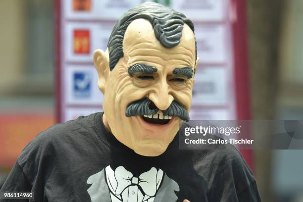 Man dressed up as Vicente Fox of The Mafia of Power team poses during the protest match between Mafia del Poder and Morena Party at Alameda Central...