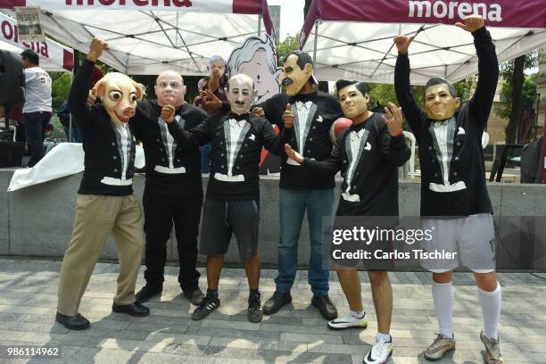 Members of The Mafia of Power team pose during the protest match between Mafia del Poder and Morena Party at Alameda Central on June 26, 2018 in...