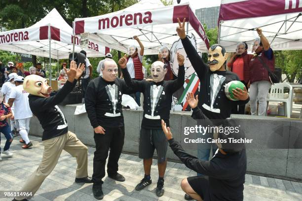 Members of The Mafia of Power team pose during the protest match between Mafia del Poder and Morena Party at Alameda Central on June 26, 2018 in...