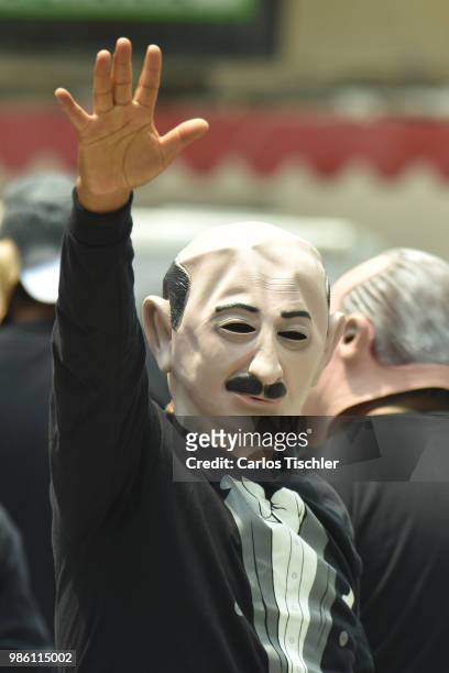 Man dressed up as Carlos Salinas of The Mafia of Power team poses during the protest match between Mafia del Poder and Morena Party at Alameda...