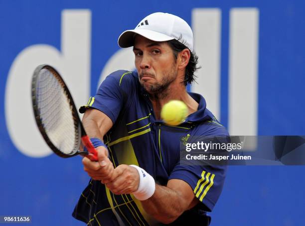 Fernando Verdasco of Spain plays a double handed backhand to Jurgen Melzer of Austria on day four of the ATP 500 World Tour Barcelona Open Banco...