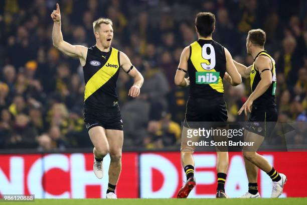Jack Riewoldt of the Tigers celebrates after kicking a goal during the round 15 AFL match between the Richmond Tigers and the Sydney Swans at Etihad...