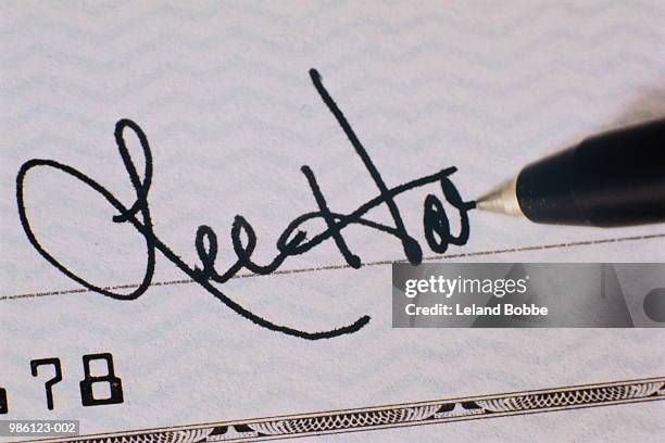 Sign Cheque 321 Signing Cheque Stock Photos, High-Res Pictures, and Images - Getty ...