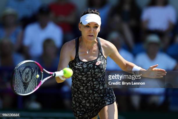 Agnieszka Radwanska of Poland in action during her match against Jelena Ostapenko of Latvia on day seven of the Nature Valley International at...