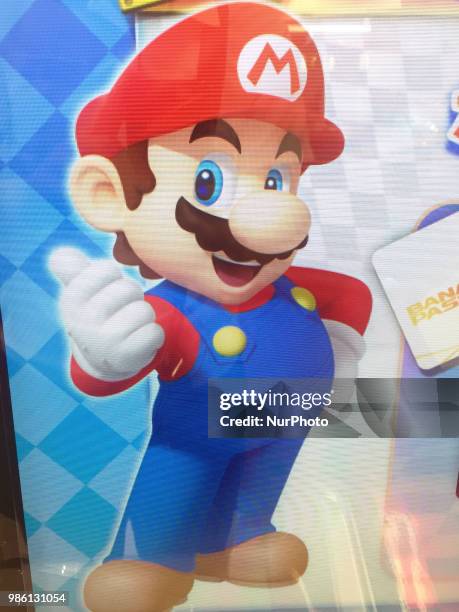 Nintendo's game character Super Mario is seen on a screen in Tokyo, Japan June 28, 2018.