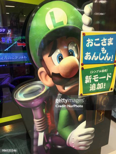 Nintendo's game character Super Mario is seen on a screen in Tokyo, Japan June 28, 2018.