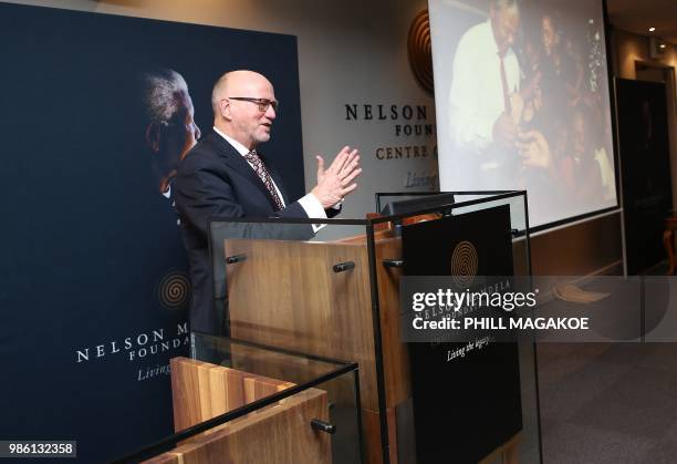 South African Minister of Tourism Derek Hanekom delivers a speech during the pre-launch of the seminal centenary publication which will be entitled...