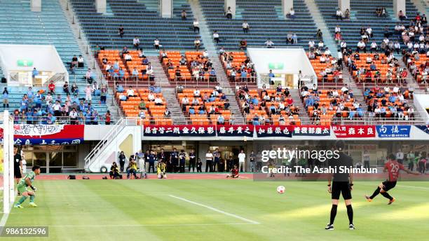 Ryuji Izumi of Nagoya Grampus shoots during the replay of the penalty shootout of the 98th Emperor's Cup second round match between Nagoya Grampus...