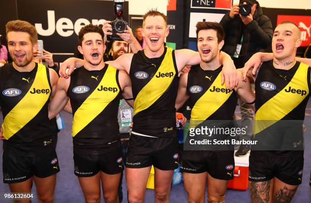 Dan Butler of the Tigers, Jason Castagna of the Tigers, Jack Riewoldt of the Tigers, Trent Cotchin of the Tigers, and Dustin Martin of the Tigers...
