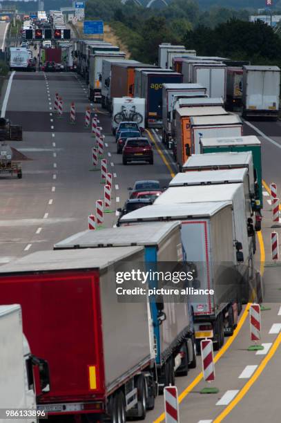 June 2018, Germany, Magdeburg: Trucks in a traffic jam directed to Berlin. The reason for this was a burning truck between Lostau and Burg. The...