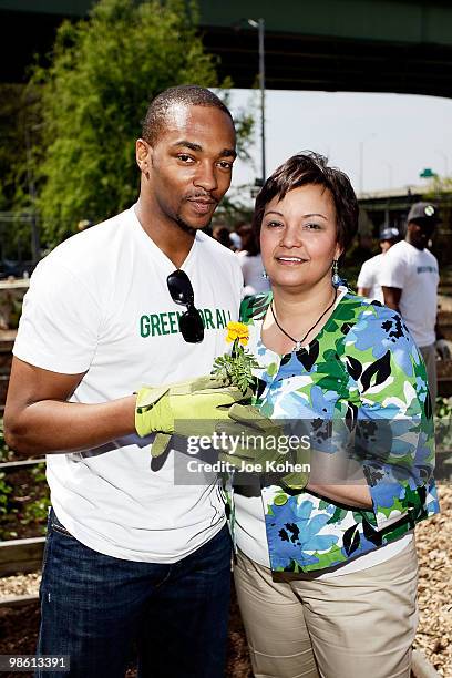 Actor Anthony Mackie and EPA Administrator Lisa Jackson participates in the Green For All Earth Day "Dig In" at Riverside Valley Community Garden on...