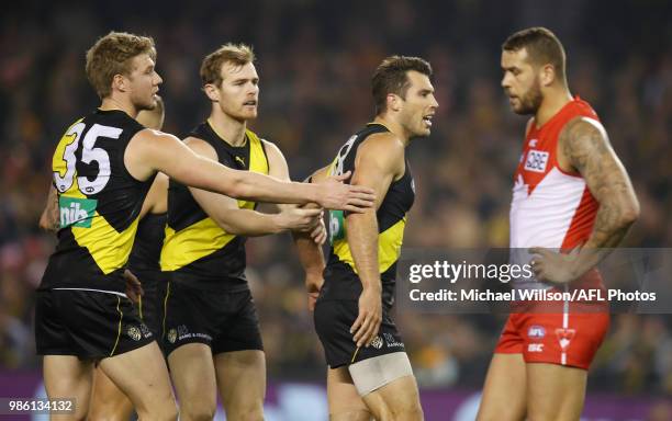 Alex Rance of the Tigers and Lance Franklin of the Swans look on during the 2018 AFL round15 match between the Richmond Tigers and the Sydney Swans...