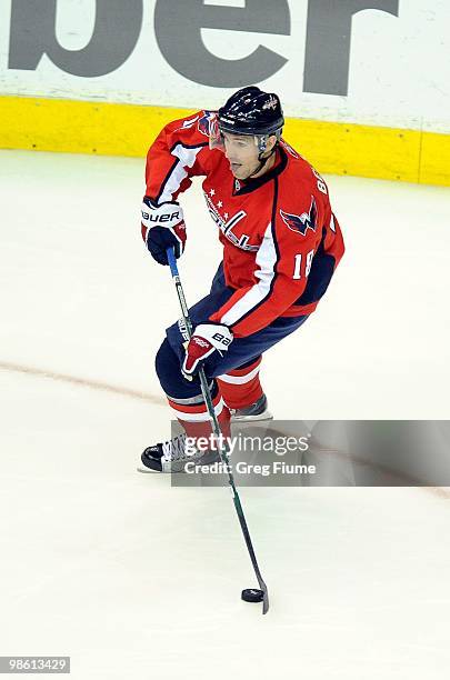 Eric Belanger of the Washington Capitals handles the puck against the Montreal Canadiens in Game One of the Eastern Conference Quarterfinals during...