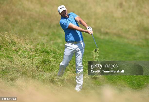 Gregory Havret of France plays his second shot on the 17th fairway during Day One of the HNA Open de France at Le Golf National on June 28, 2018 in...