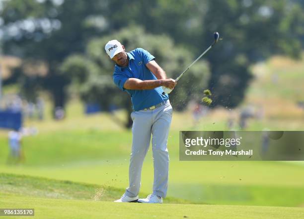 Gregory Havret of France plays his second shot on the 14th fairway during Day One of the HNA Open de France at Le Golf National on June 28, 2018 in...