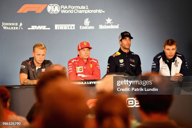 The Drivers Press Conference with Kevin Magnussen of Denmark and Haas F1, Kimi Raikkonen of Finland and Ferrari, Daniel Ricciardo of Australia and...