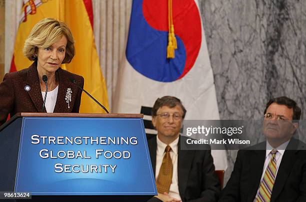 Second Vice President and Minister of Finance Elena Salgado speaks while Bill Gates , co-chairman of the Bill and Melinda Gates Foundation and...