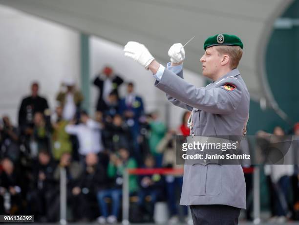 German soldiers parading during a welcome ceremony with military honors at the German Chancellory on June 26, 2018 in Berlin, Germany.