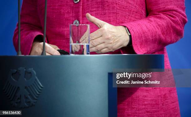 German Chancellor Angela Merkel gestures during a news conference with the Spanish Prime Minister Pedro Sanchez after their meeting in the German...