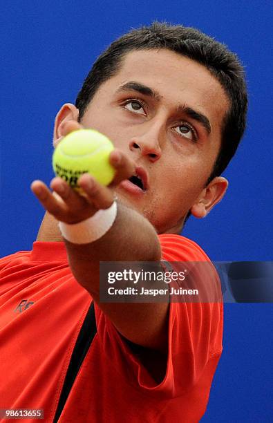 Nicolas Almagro of Spain serves the ball to Jo-Wilfried Tsonga of France on day four of the ATP 500 World Tour Barcelona Open Banco Sabadell 2010...