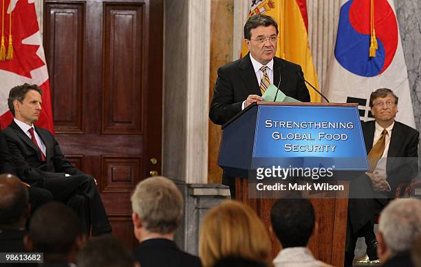 Canadian Minister of Finance James Flaherty speaks while Bill Gates , co-chairman of the Bill and Melinda Gates Foundation and Treasury Secretary...