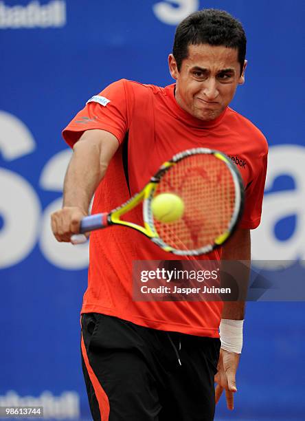 Nicolas Almagro of Spain plays a forehand to Jo-Wilfried Tsonga of France on day four of the ATP 500 World Tour Barcelona Open Banco Sabadell 2010...