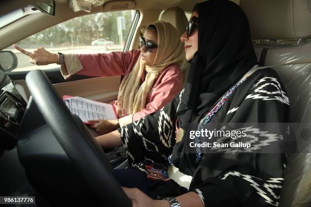 Student Dalia Mufti practices driving with her instructor, Heba Shaker, at the Jeddah Advanced Driving School at King Abdulaziz University the day...