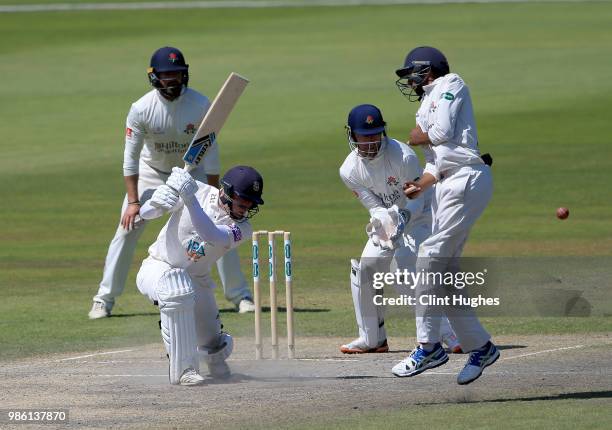 Tom Alsop of Hampshire bats during day four of the Specsavers County Championship game at Old Trafford on June 28, 2018 in Manchester, England.