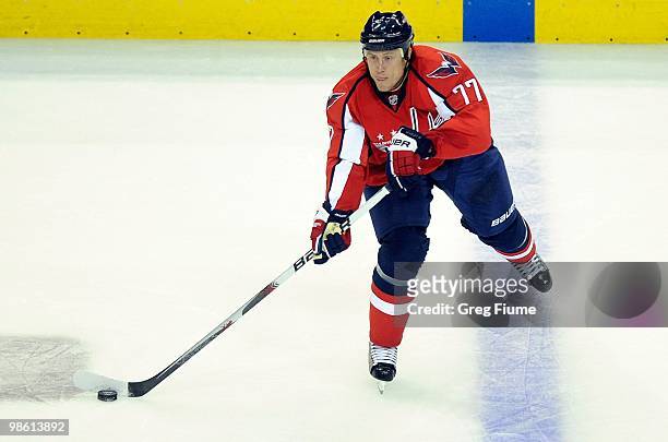 Joe Corvo of the Washington Capitals handles the puck against the Montreal Canadiens in Game One of the Eastern Conference Quarterfinals during the...