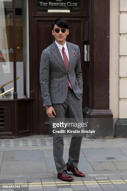 Model and Actor Hu Bing during London Fashion Week Men's on June 9, 2018 in London, England.