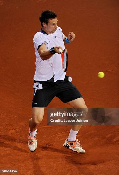 Robin Soderling of Sweden jumps to play a forehand to Feliciano Lopez of Spain on day four of the ATP 500 World Tour Barcelona Open Banco Sabadell...