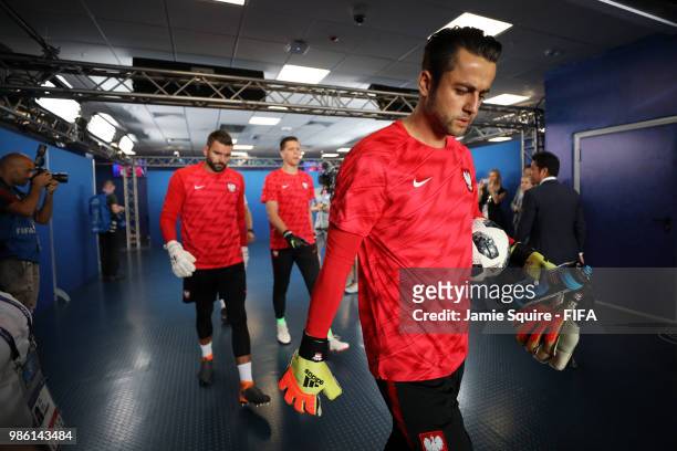 Lukasz Fabianski of Poland reaches the pitch for warm up prior to the 2018 FIFA World Cup Russia group H match between Japan and Poland at Volgograd...