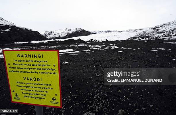 To go with ICELAND-VOLCANO-ERUPTION-KATLA-FOCUS A warning sign is pictured at one of the base of the Myrdalsjokull glacier, which is part of the ice...