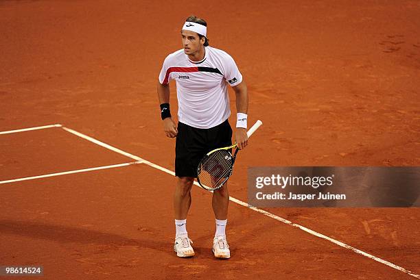 Feliciano Lopez of Spain reacts during his match against Robin Soderling of Sweden on day four of the ATP 500 World Tour Barcelona Open Banco...