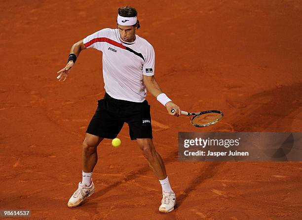 Feliciano Lopez of Spain plays a forehand to Robin Soderling of Sweden on day four of the ATP 500 World Tour Barcelona Open Banco Sabadell 2010...