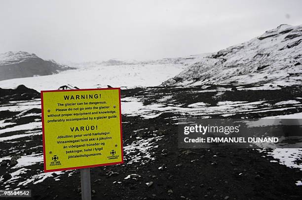 To go with ICELAND-VOLCANO-ERUPTION-KATLA-FOCUS A warning sign is pictured at one of the base of the Myrdalsjokull glacier, which is part of the ice...
