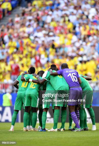 The Senegal players form a team huddle prior to the 2018 FIFA World Cup Russia group H match between Senegal and Colombia at Samara Arena on June 28,...