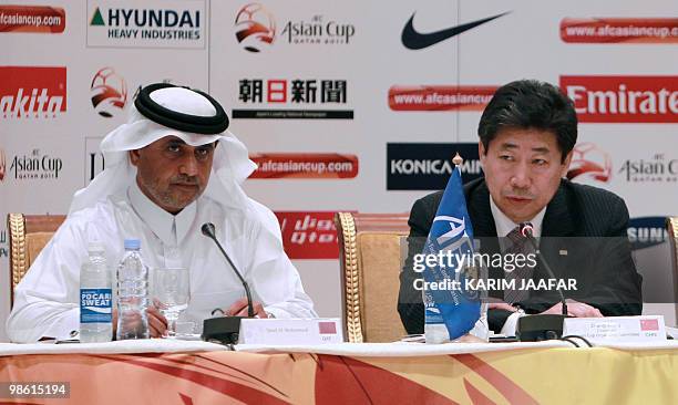 Saud al-Mohannadi , general secretary of the Qatar Football Association, and Zhang Jilong, the Chinese chairman of the organising committee of the...