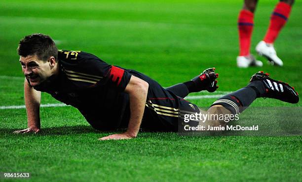 Steven Gerrard of Liverpool looks despondent after a missed chance during the UEFA Europa League Semi Final first leg match between Atletico Madrid...