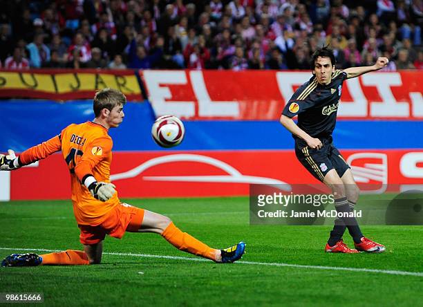 Yossi Benayoun of Liverpool shoots past David De Gea of Atletico Madrid but the goal is disallowed during the UEFA Europa League Semi Final first leg...