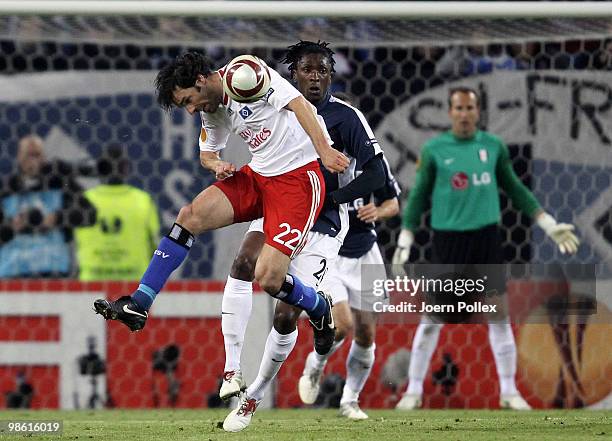 Ruud van Nistelrooy of Hamburg and Dickson Etuhu of Fulham compete for the ball during the UEFA Europa League semi final first leg match between...